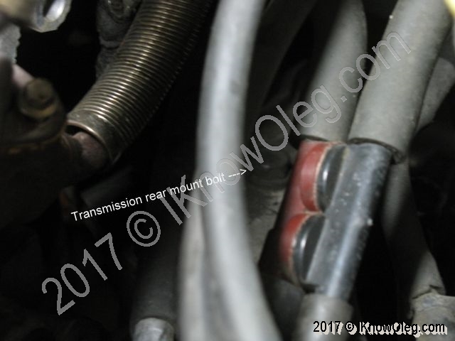 Remove Chrysler rear transmission mount bolt