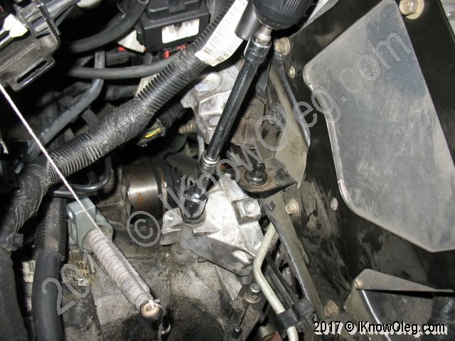 Remove Chrysler left transmission mount